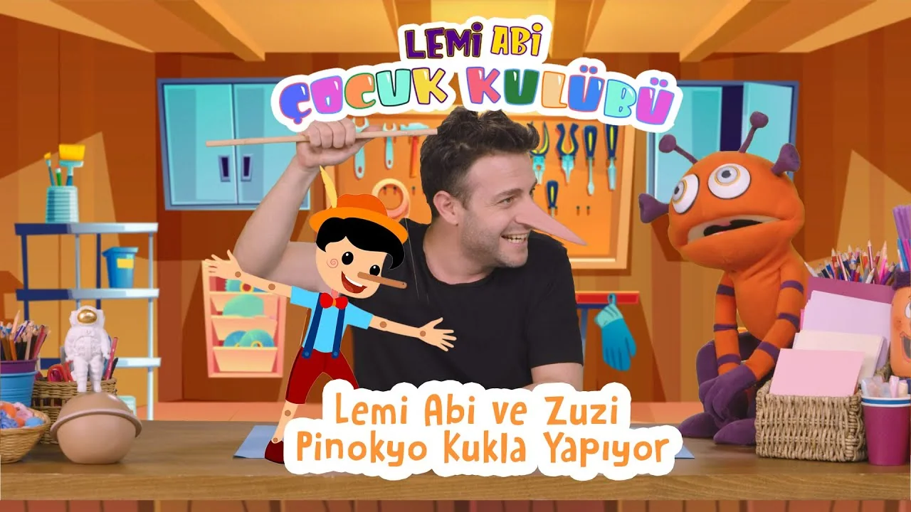 Thumbnail for the Pinocchio puppet video, with Lemi Filozof, Zuzi, and a Pinocchio puppet.