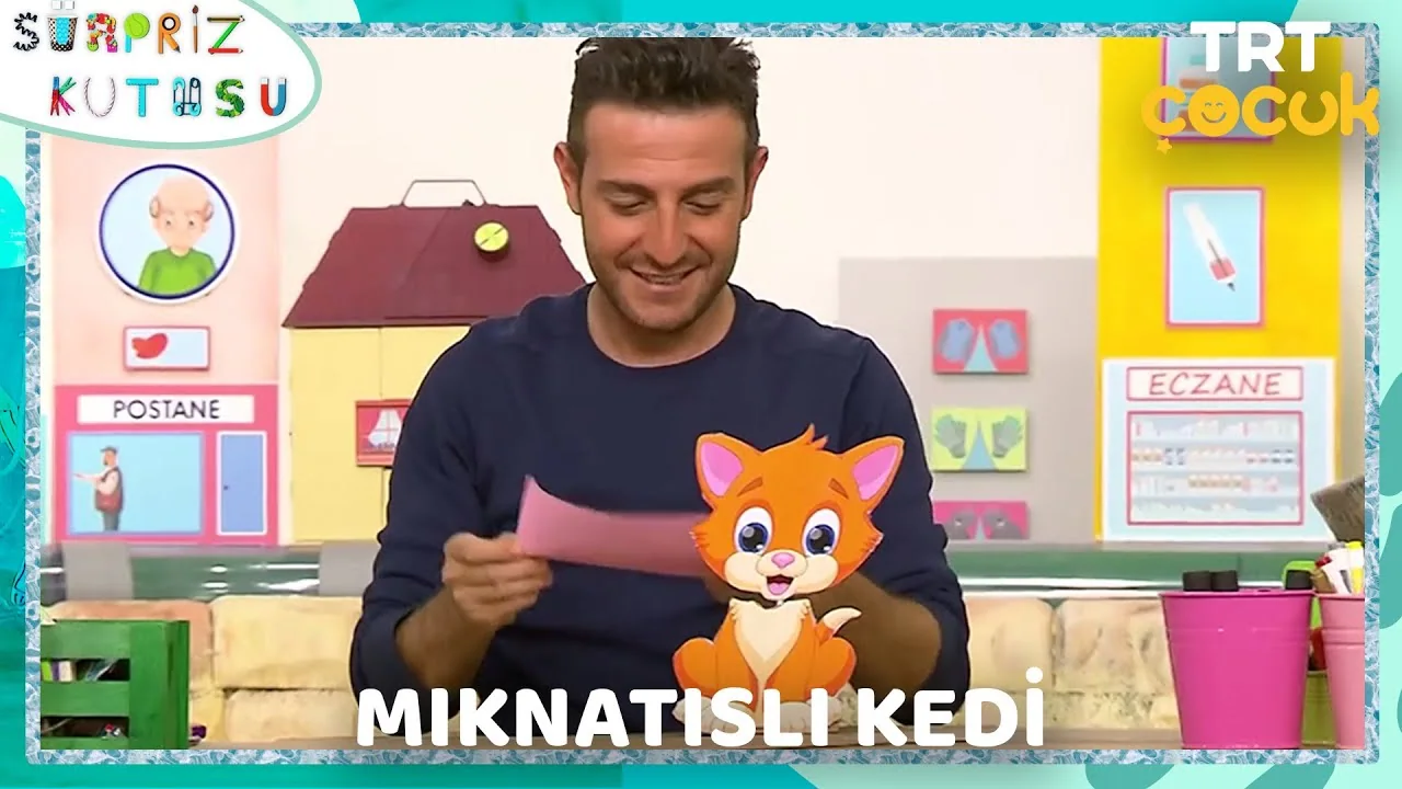 Thumbnail for the Sürpriz Kutusu episode Mıknatıslı Kedi, with Lemi Filozof and a handmade cat on the set.